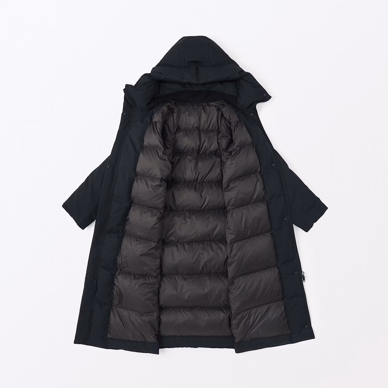 Wie bekomme ich meinen Daunenmantel wieder fluffig?