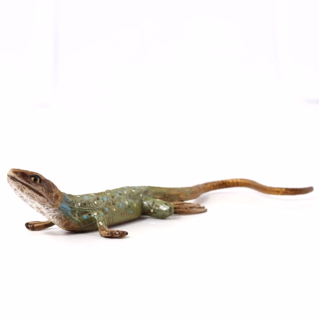 Welche Marke hat ein Getränk mit Eidechsenlogo?