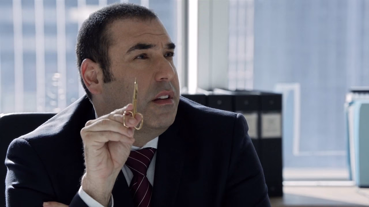 Warum wurde Louis bei Suits gefeuert?